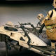 A toy Scout Trooper, complete with mini Baby Yoda and a speeder bike.
